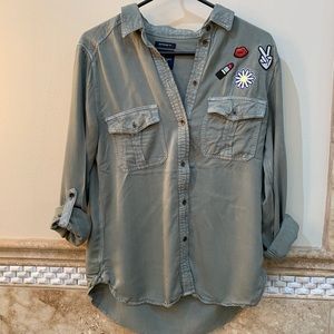Green button down shirt